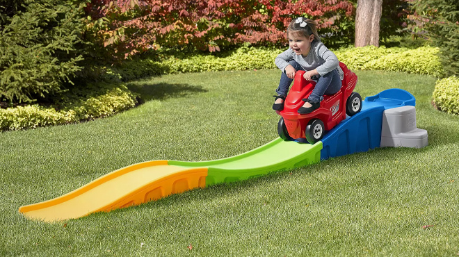 Kid playing on Step2 Anniversary Edition Up Down Roller Coaster