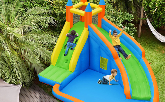 Kids Playing in the Costway Inflatable Water Slide Bounce House
