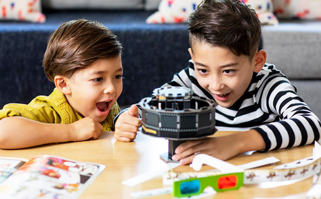 Kids Using Little Passports Kit to Learn About Science