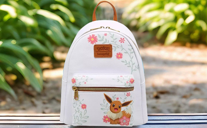 Loungefly Pokemon Eevee Spring Flowers Mini Backpack on a Bench