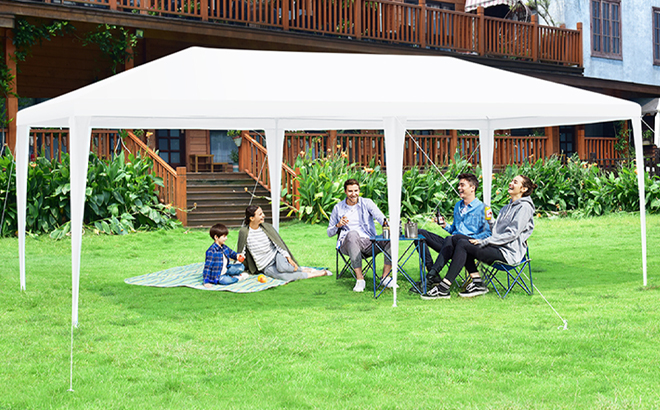 People Sitting Under the Heavy-Duty 10 x 20-Foot Canopy Tent