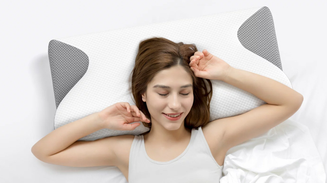 Person Sleeping on a Cervical Pillow