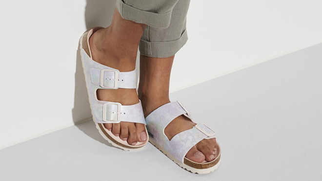 Person Wearing Womens Birkenstock Arizona Sandal in Iridescent Rose