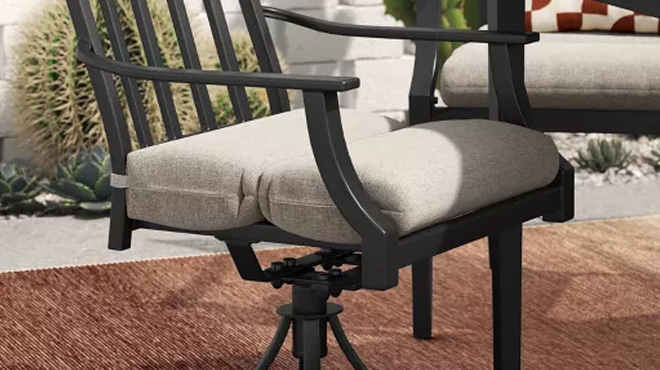 Threshold Heathered Outdoor Chair Seat Cushion on a Chair