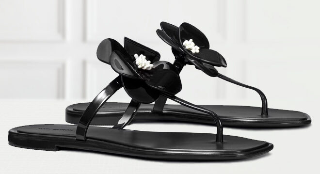 Tory Burch Flower Jelly Sandals on the Table