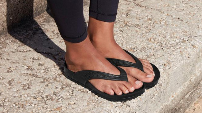 a Person Wearing Birkenstock Honolulu EVA Thong Sandals