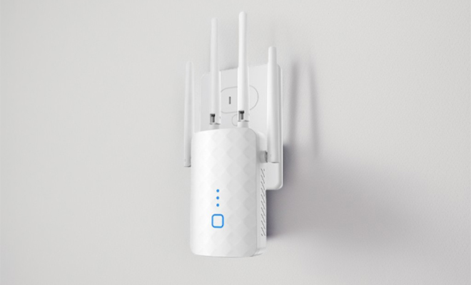 2024 WiFi Extender 1 2Gbps Signal Booster on a Wall