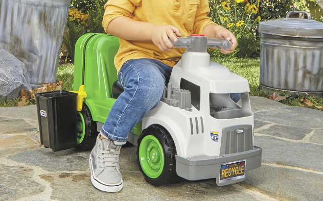 A Boy Playing with Little Tikes Dirt Diggers Garbage Truck Scoot Ride On Toy
