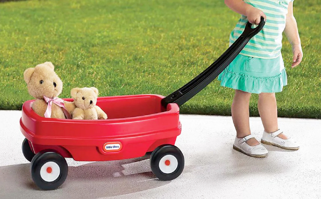 A Girl Pulling a Little Tikes Lil Wagon