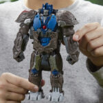 A Kid is Holding Transformers Rise of the Beasts Optimus Primal Kids Toy Action Figure