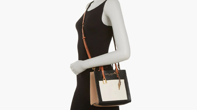 A Mannequin Wearing Marc Jacobs Mini Grind Coated Leather Tote