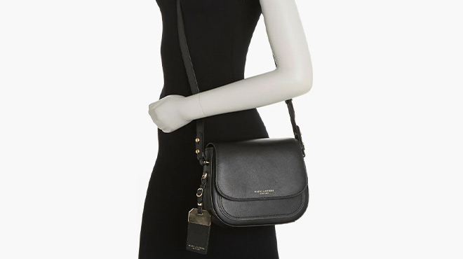 A Mannequin Wearing Marc Jacobs Mini Rider Crossbody Bag