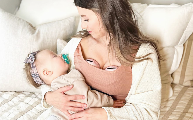 A Mother Wearing a MomMed Double Wearable Breast Pump