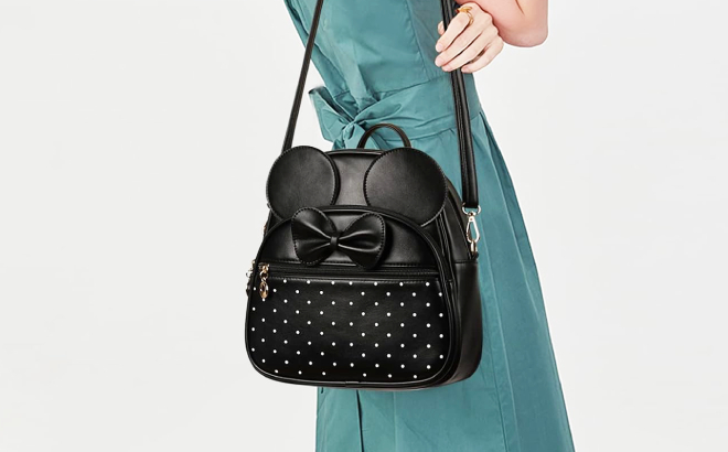 A Person Carrying a Bowknot Polka Mini Backpack