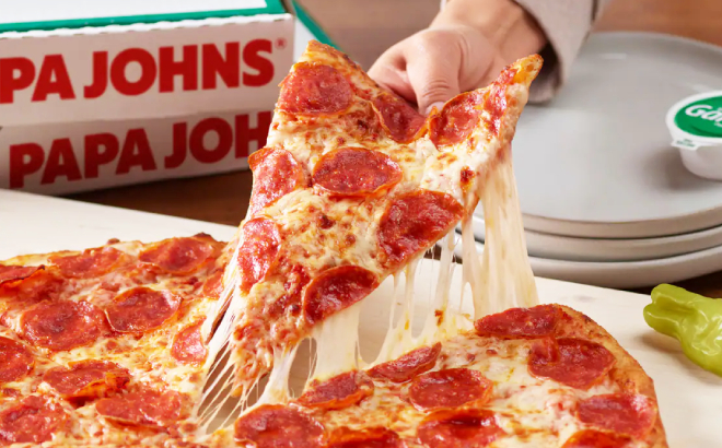 A Person Getting a Slice of Papa Johns Pepperoni Pizza