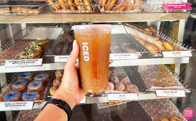 A Person Holding Dunkin Drink