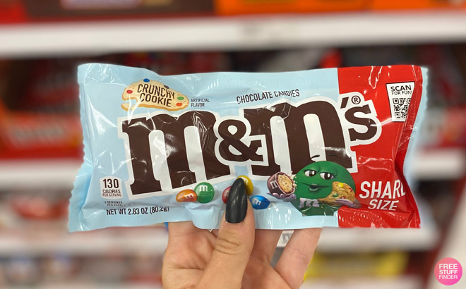 A Person Holding MMs Crunchy Cookie Milk Chocolate Candy Share Size