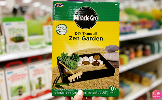 A Person Holding Miracle Gro DIY Tranquil Zen Garden