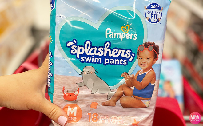 A Person Holding Pampers Splashers Swim Pants