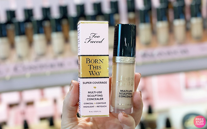 A Person Holding Too Faced Born This Way Super Coverage Concealer