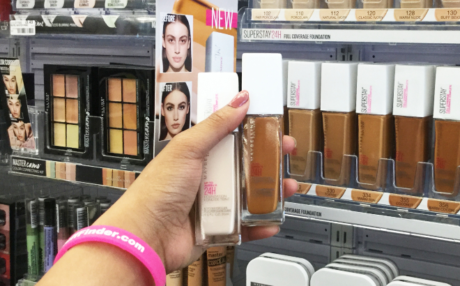 A Person Holding Two Maybelline SuperStay Full Coverage Foundation