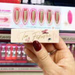 A Person Holding a Too Faced Too Femme Heart Core Lipstick