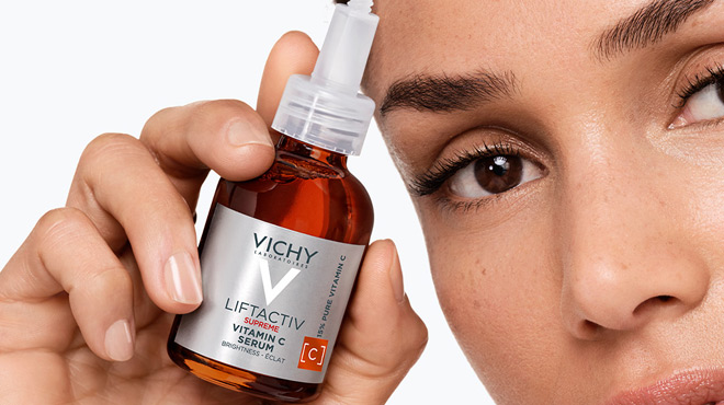 A Person Holding a Vichy Laboratories Vitamin C Serum