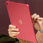 A Person Holding an Apple 10 9 Inch iPad in Pink Color