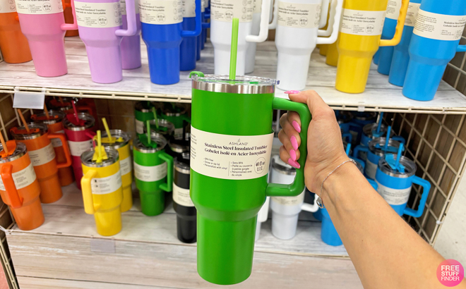 A Person Holding an Ashland Insulated Tumbler in Green