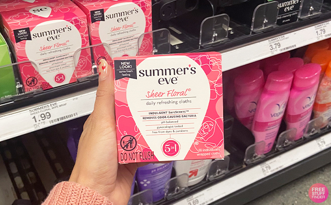 A Person Holding the Summers Eve Sheer Floral 5 in 1 Feminine Wipes 12 Count at Target