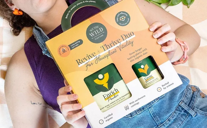 A Person Holding the We the Wild Houseplant Revive and Thrive Kit