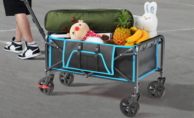 A Person Pulling the Collapsible Mini Camping Wagon