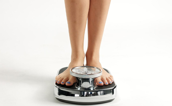 A Person Standing on the Scale