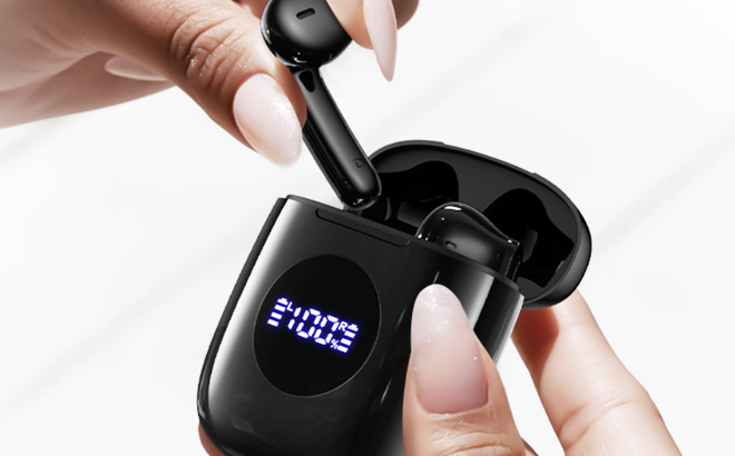 A Person Taking Wireless Earbuds from Its Charging Case