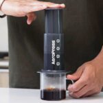 A Person Using AeroPress Original Coffee and Espresso Style Maker