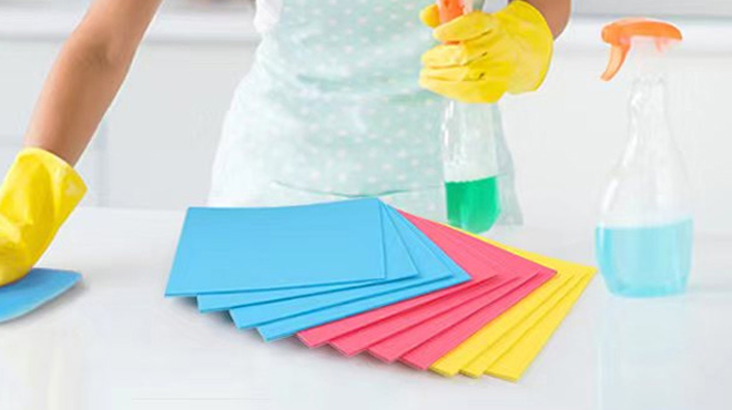 A Person Using a Homexcel Swedish Dishclothe to Clean a Kitchen Counter 1