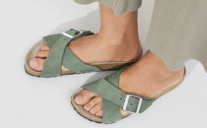 A Person Wearing Birkenstock Siena Suede Leather Sandals