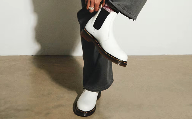 A Person Wearing Dr Martens Chelsea Boots