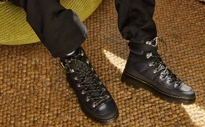 A Person Wearing Dr Martens Combs Tech Quilted Casual Boots