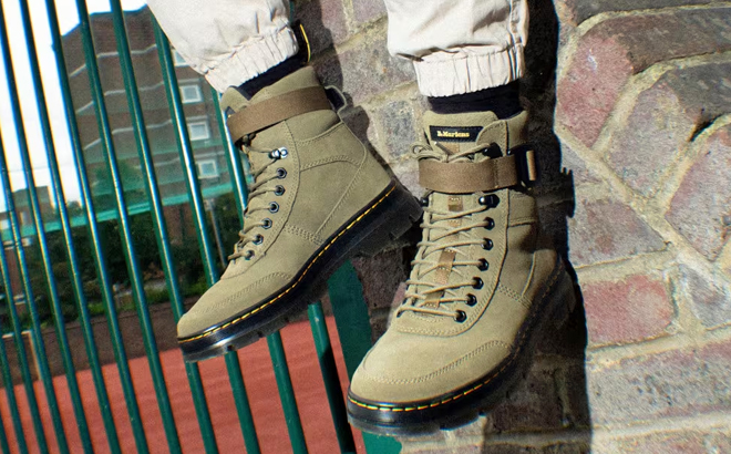 A Person Wearing Dr Martens Combs Tech Suede Casual Boots