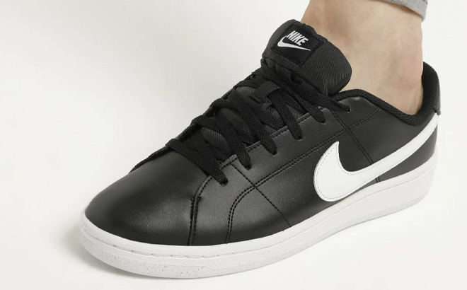 A Person Wearing Nike Court Royale 2 Sneaker