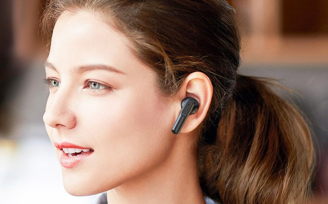 A Person Wearing Occiam Wireless Earbuds
