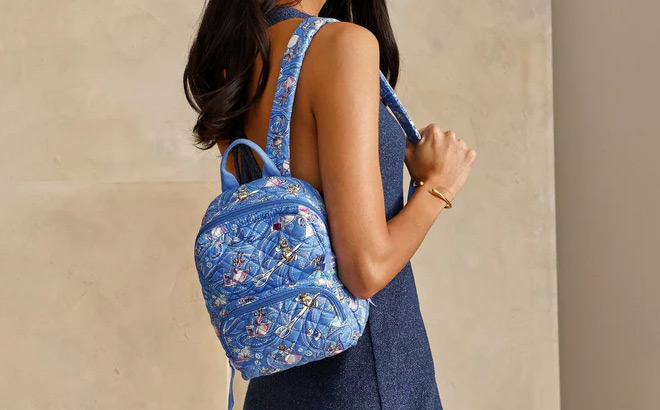 A Person Wearing Vera Bradley Disney Mini Backpack