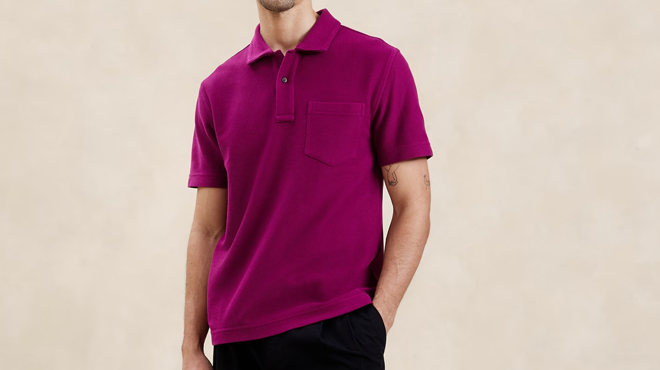 A Person Wearing a Banana Republic Summerweight Textured Polo in Tropical Berry Color