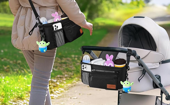 A Person pushing a Stroller with Universal Stroller Organizer attached to it