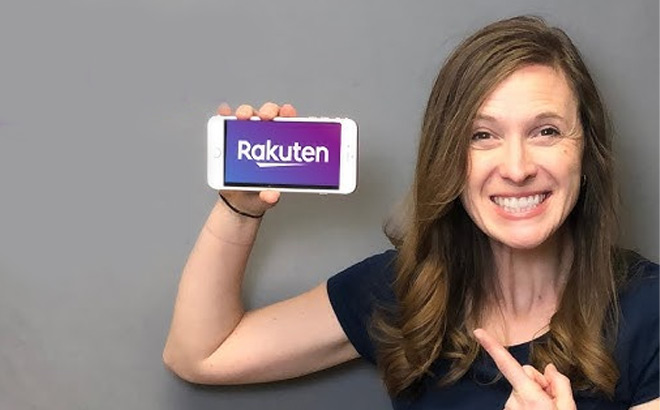 A Woman Holding a Phone with Rakuten on the Background