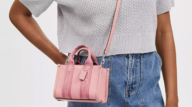 A Woman Wearing Coach Outlet Smith Mini Tote