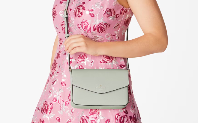 A Woman Wearing Kate Spade Sadie Envelope Crossbody