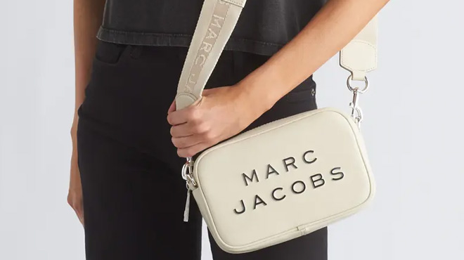 A Woman Wearing Marc Jacobs Flash Crossbody Bag