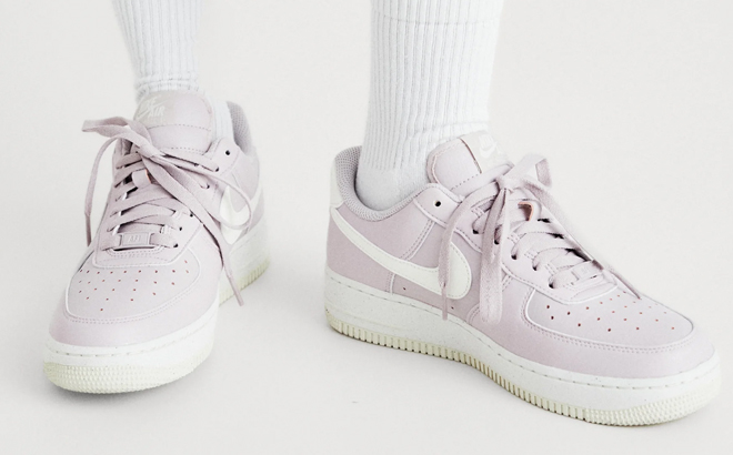 A Woman Wearing Nike Air Force 1 '07 Low SE Next Nature Shoes